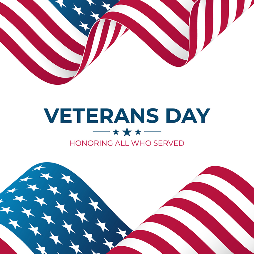 An illustration with waving American flags at top and bottom. In the center, on a white background, are the words &quot;Veterans Day&quot; and &quot;Honoring All Who Served.&quot;