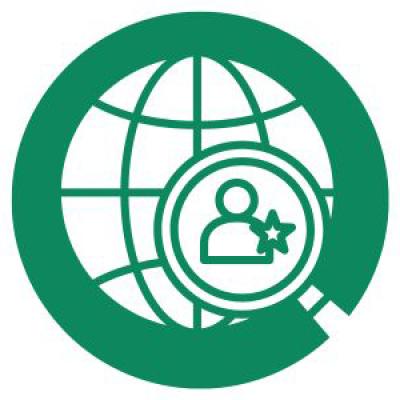 Icon of a globe with a magnifying glass focused upon a person.