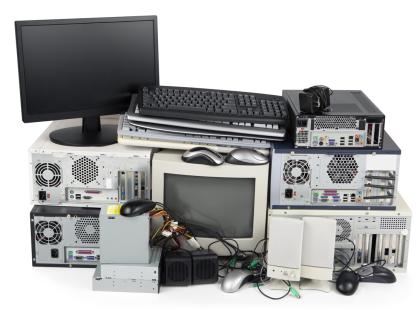 Image of a stack of surplus computing equipment.